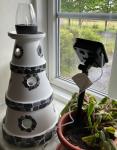 Ceramic lighthouse with solar light.